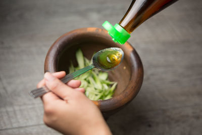 Close-up of hands preparing food