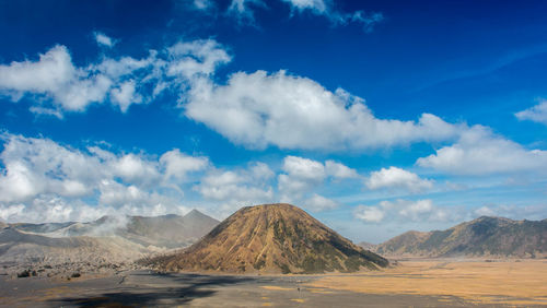 View of landscape against cloudy sky