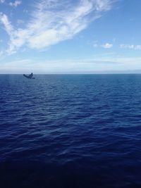 Scenic view of seascape against cloudy sky