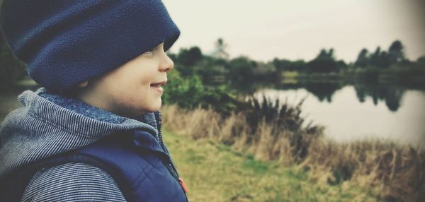 Little boy at a lake