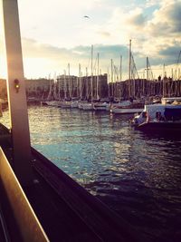 Boats moored at harbor