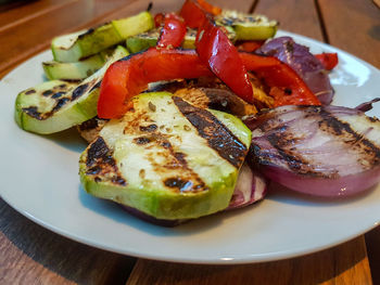 Close-up of vegetables served in plate on table.