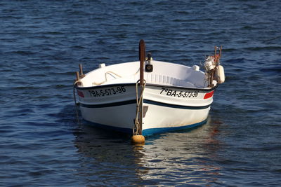 Boat moored on sea