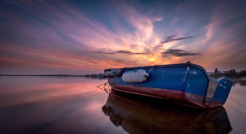 Scenic view of sea at sunset