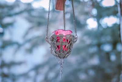 Close-up of religious equipment hanging outdoors