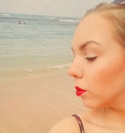 Woman standing on beach