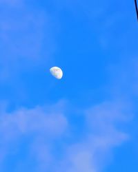 Low angle view of moon in sky