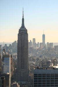 Cityscape against sky during sunset