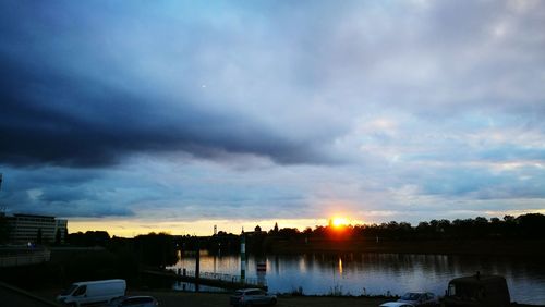 Scenic view of sunset over city