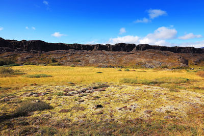 Scenic view of land against sky