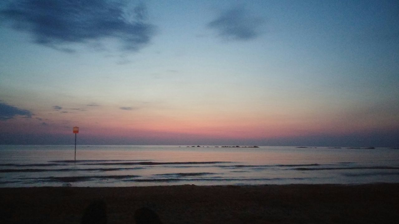 sea, beach, horizon over water, sunset, water, shore, scenics, sky, tranquil scene, tranquility, beauty in nature, nature, silhouette, sand, idyllic, orange color, dusk, coastline, cloud - sky, outdoors