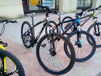 Bicycle parked on footpath in city