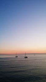 Scenic view of sea at sunset