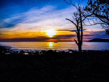 Scenic view of sea at sunset