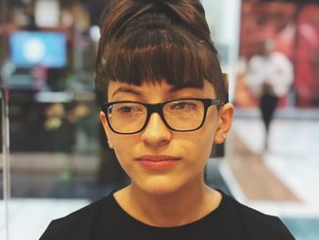 Close-up portrait of boy wearing eyeglasses