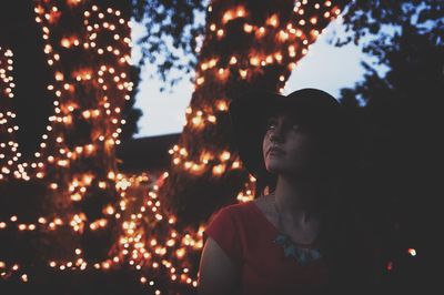 Blurred motion of woman at night