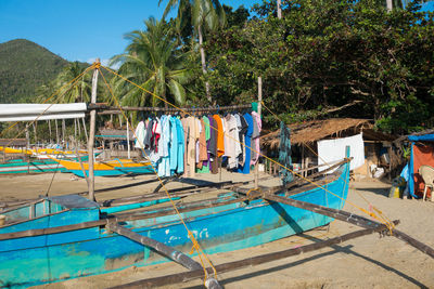 Clothes drying on clothesline against sky