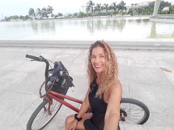 Portrait of smiling woman curly hair