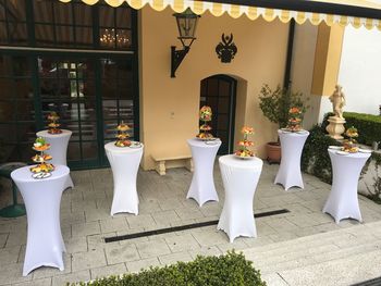 View of potted plants against built structure