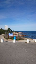 View of beach against blue sky