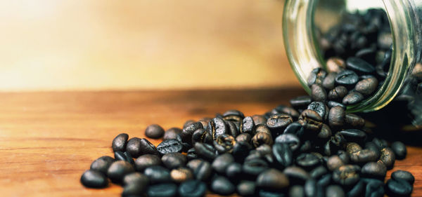 Close-up of coffee beans on table