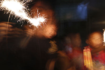 Close-up of firework display at night