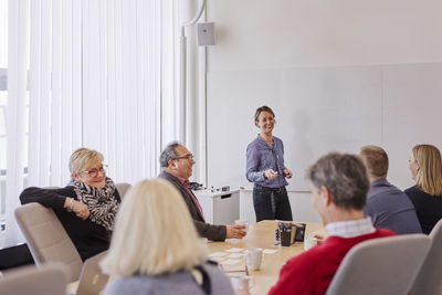 People taking during business meeting