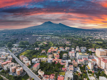 Aerial view of townscape against sky during sunset