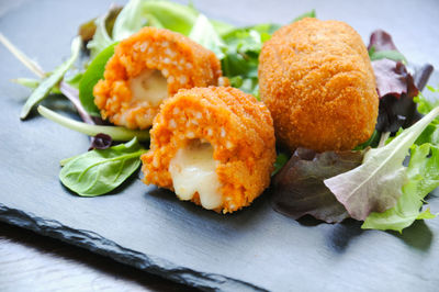 Close-up of food served on table