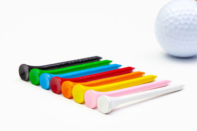 Close-up of multi colored balls on table