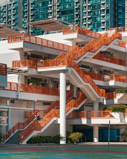 High angle view of staircase by building in city