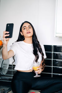 Young woman using mobile phone