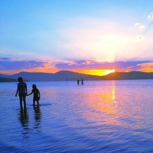 Scenic view of sea at sunset