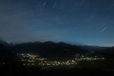 Illuminated cityscape at night