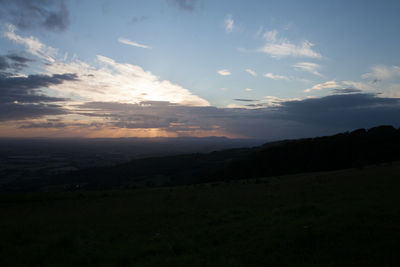 Scenic view of silhouette landscape against sky during sunset