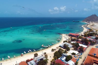 High angle view of swimming pool by sea against sky