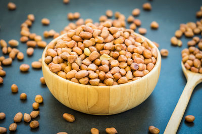 High angle view of peanuts in bowl on table