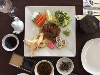 Close-up of food served on table