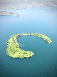 High angle view of volcanic caldera island