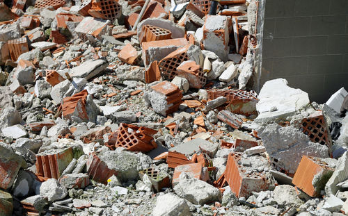 High angle view of broken stack against wall