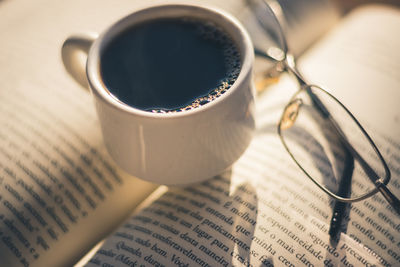 High angle view of coffee cup on table