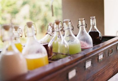 Close-up of wine bottles on table