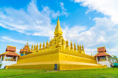 Low angle view of temple against building