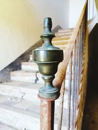 Close-up of rusty railing on staircase