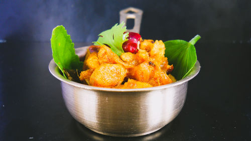 Close-up of fruits in bowl on table