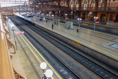 Train on railroad station platform in city