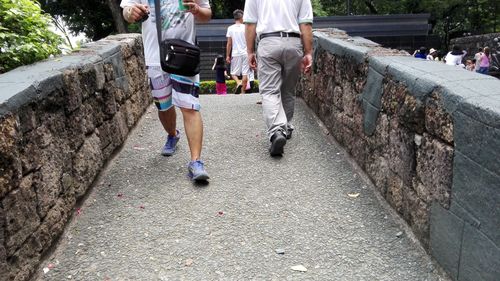 Man walking on footpath