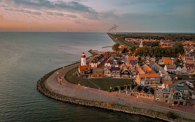 High angle view of sea against sky during sunset