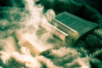 High angle view of open book on table