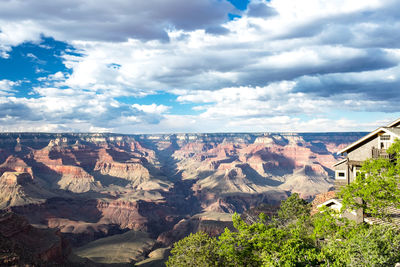 Scenic view of rock formations at grand canyon against cloudy sky